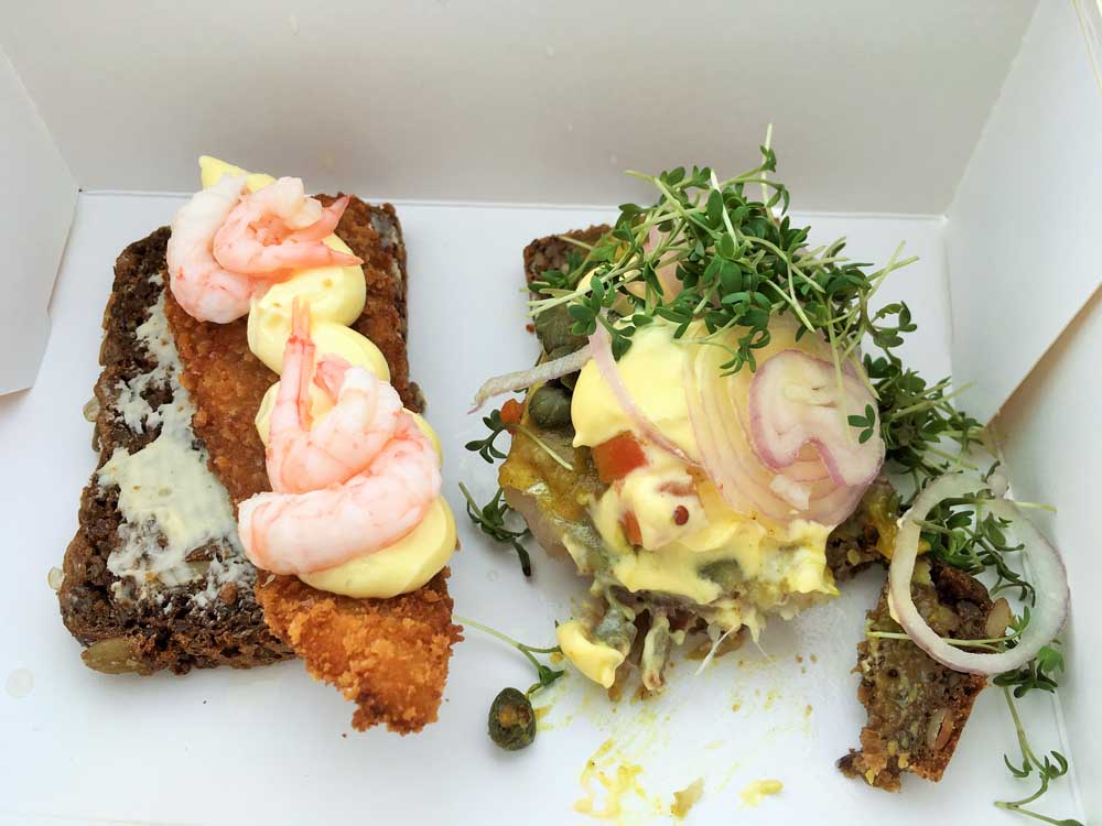 prawns on bread and herring on bread Smørrebrød: the Danish open sandwich
