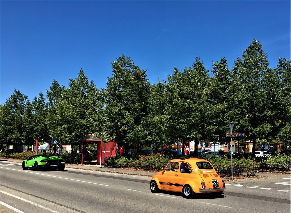 Fiat and Lamborghini on Italian street