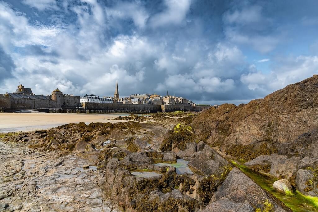 St Malo with rocks in foreground